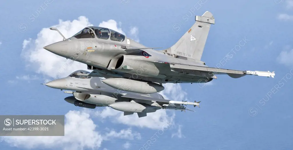 A Dassault Rafale of the French Air Force flys alongside a U.S. Air Force F-16C Fighting Falcon over Brazil during Cruzeiro Do Sul (CRUZEX). CRUZEX V is a multinational exercise encompassing real means from the Air Forces of Argentina, Brazil, Chile, France, Uruguay, United States, Venezuela and simulated means from Land and Maritime Components that takes place October 28th to November 19th, 2010, on the Northeast coast of Brazil.