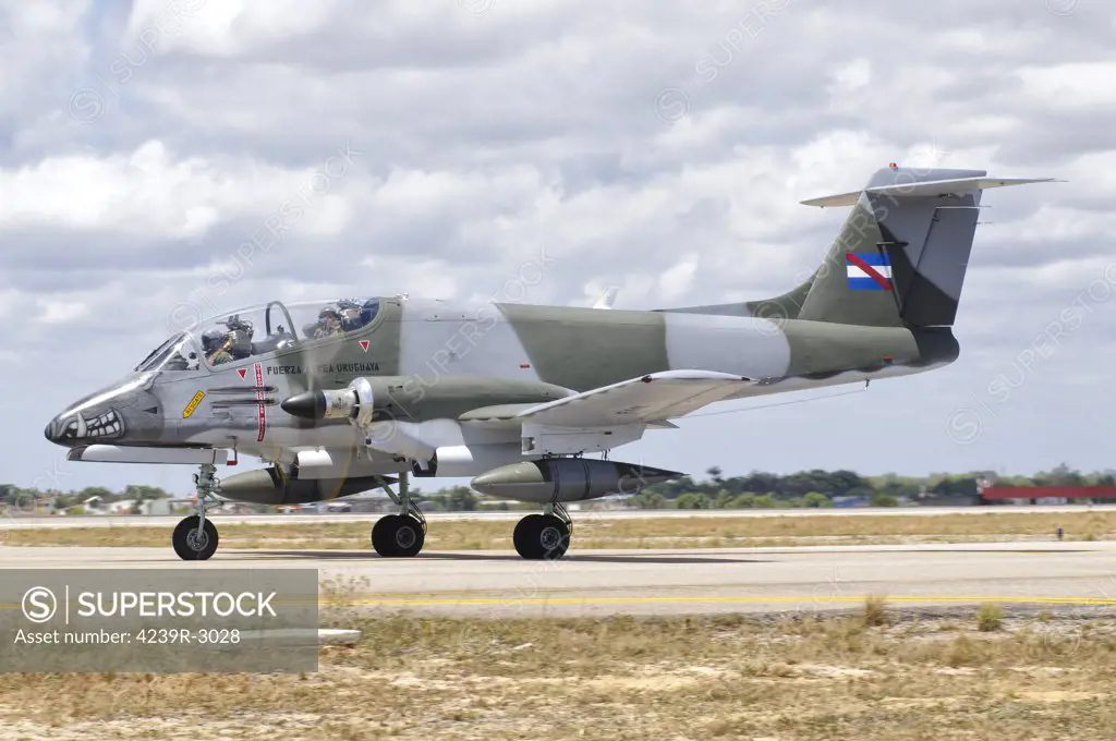 A Uruguayan Air Force IA-58 Pucara on the flight line at Natal Air Force Base, Brazil, during Cruzeiro Do Sul (CRUZEX). CRUZEX V is a multinational exercise encompassing real means from the Air Forces of Argentina, Brazil, Chile, France, Uruguay, United States, Venezuela and simulated means from Land and Maritime Components that takes place October 28th to November 19th, 2010, on the Northeast coast of Brazil.