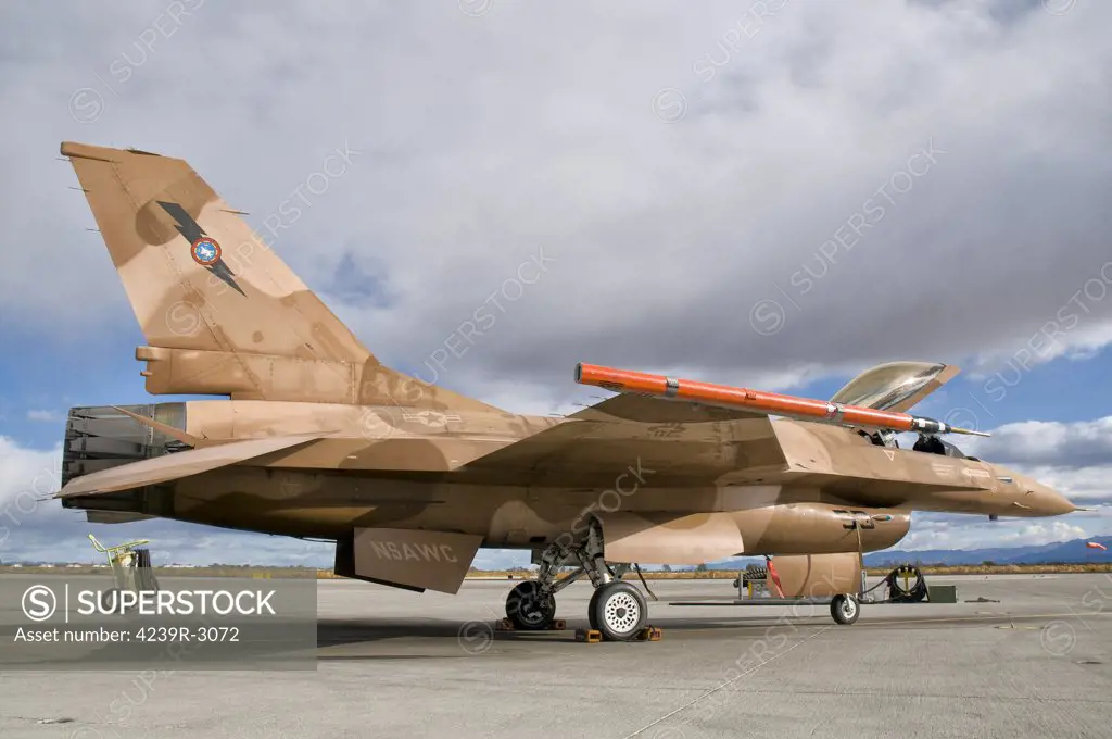 An F-16A Fighting Falcon of the famous US Navy TOPGUN Naval Fighter Weapons School at the Naval Strike and Air Warfare Center, Naval Air Station Fallon, Nevada.