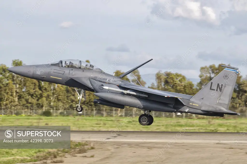 An F-15E Strike Eagle from RAF Lakenheath deploys from Decimomannu Air Base, Italy.
