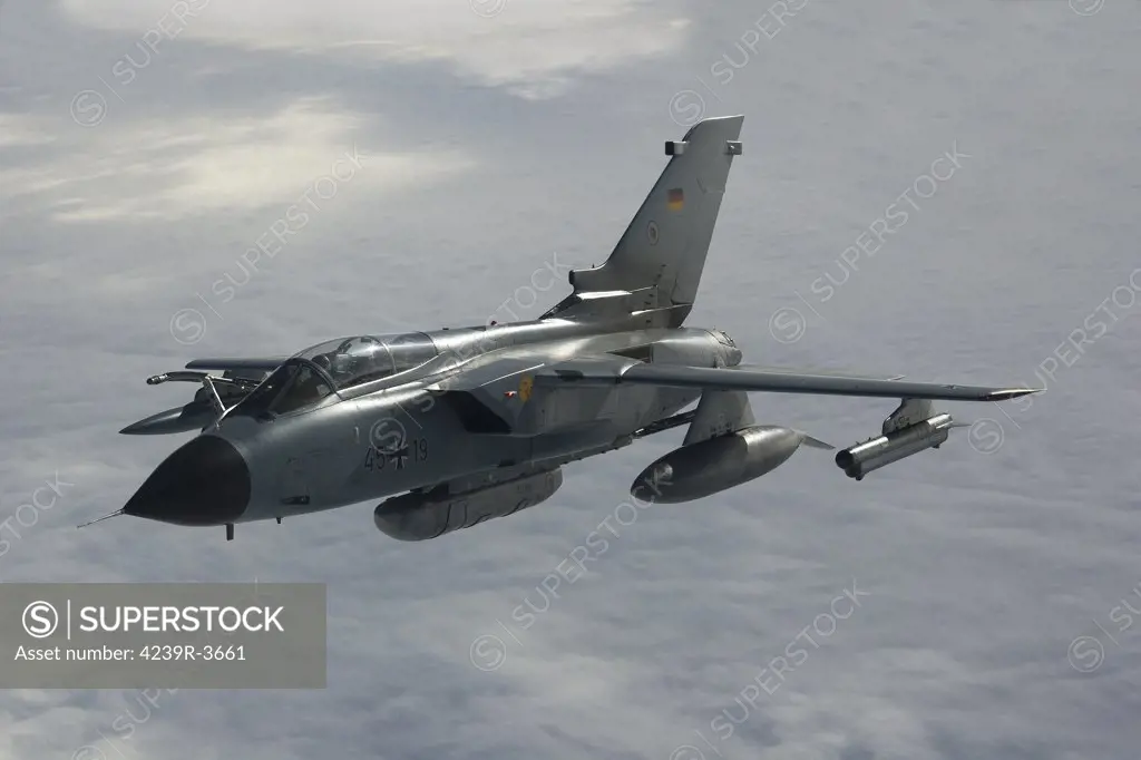 Luftwaffe Tornado IDS of Aufklarungsgeschwader 51 Immelmann over northern Germany during refueling training with a KC-135R of the 100th ARW, United States Air Force Europe. This Tornado carries a reconnaissance pod and wears the yellow badge of Einsatzgeschwader Mazar-e-Shariff (ISAF) on the intake.
