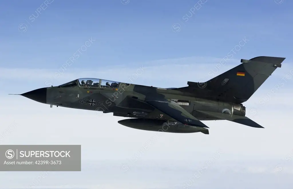 A Luftwaffe Tornado IDS of Jagdbombergeschwader 33 over northern Germany during fueling training with a KC-135R of the 100th ARW, United States Air Force Europe. This aircraft still wears the camouflage colors of the German Marineflieger.