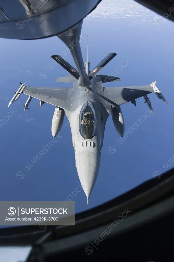 April 8, 2011 - A Dutch F-16AM armed with AIM-120 AMRAAM and AIM-9 Sidewinder missiles refuels during a combat air patrol sortie in support of Operation Unified Protector over the Mediterranean Sea close to Libya.
