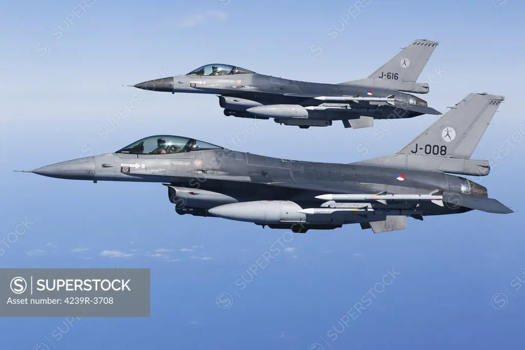 April 8, 2011 - Dutch F-16AMs armed with AIM-120 AMRAAM and AIM-9 Sidewinder missiles during a combat air patrol sortie in support of Operation Unified Protector over the Mediterranean Sea close to Libya.