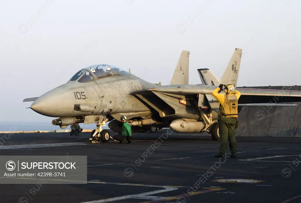 North Arabian Gulf, October 17, 2005 - An F-14D Tomcat of VF-31 Tomcatters (Carrier Air Wing 8) in launch position on the flight deck of USS Theodore Roosevelt in support of Operation Enduring Freedom.