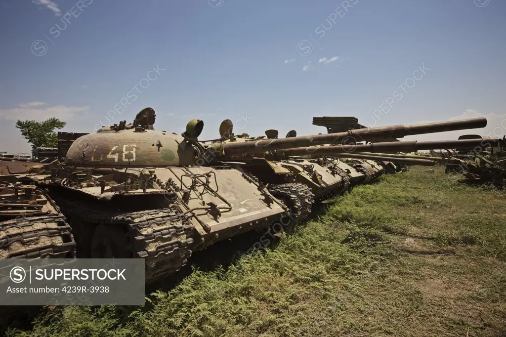 Russian T-62 main battle tanks rest in an armor junkyard in Kunduz, Afghanistan.