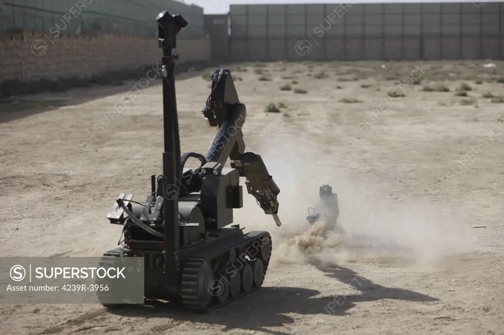 German Army explosive ordnance disposal team demonstrates the capabilities of the tEODor heavy-duty EOD robot at a U.S. manned camp in Northern Afghanistan.