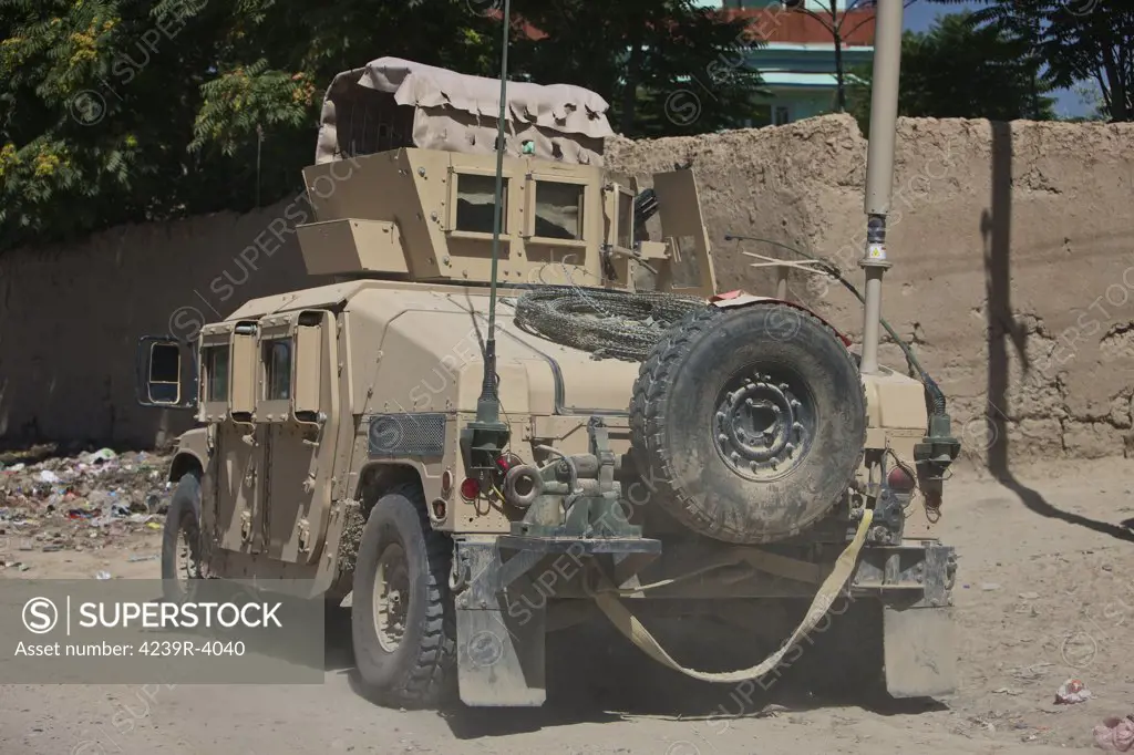 The High Mobility Multipurpose Wheeled Vehicle (HMMWV), better known as the humvee, patrols the streets of Kunduz in Northern Afghanistan.