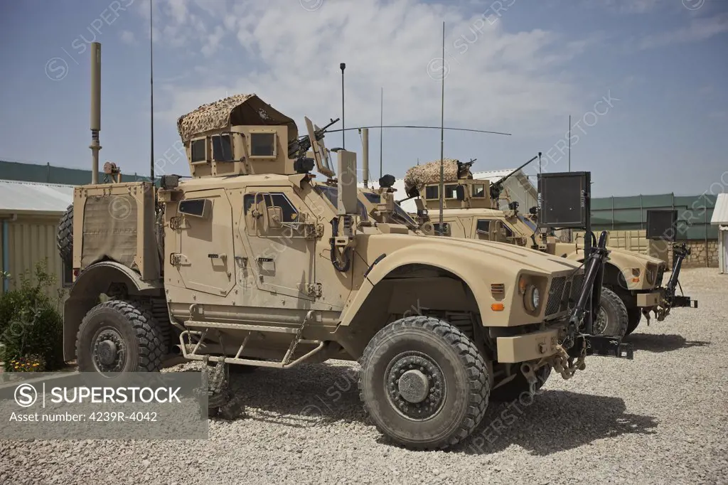 An Oshkosh M-ATV MRAP (Mine Resistant Ambush Protected) parked at a military base in Afghanistan.