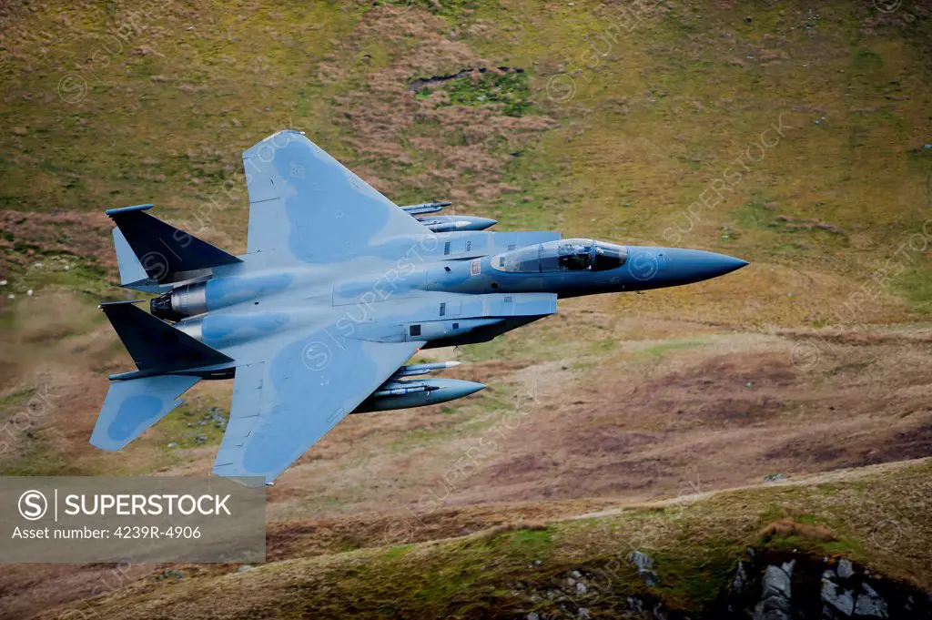 F-15E Strike Eagle low flying over North Wales, United Kingdom.