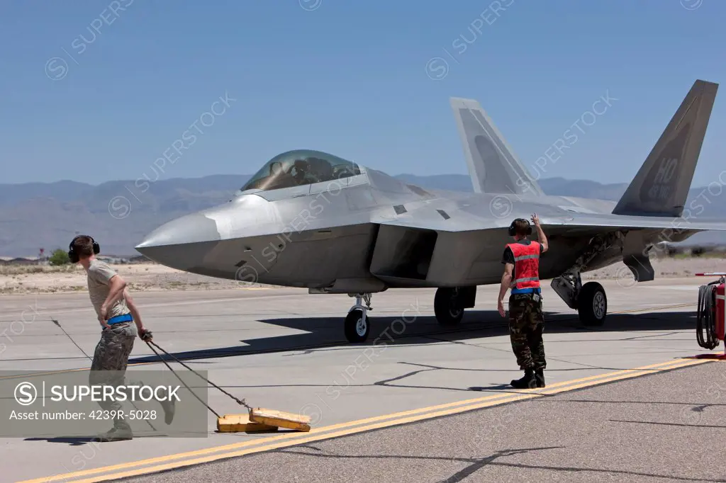 49th Fighter Wing Maintenance crews work their end of runway checks with F-22 Raptor crews prior to takeoff at Holloman Air Force Base, New Mexico.