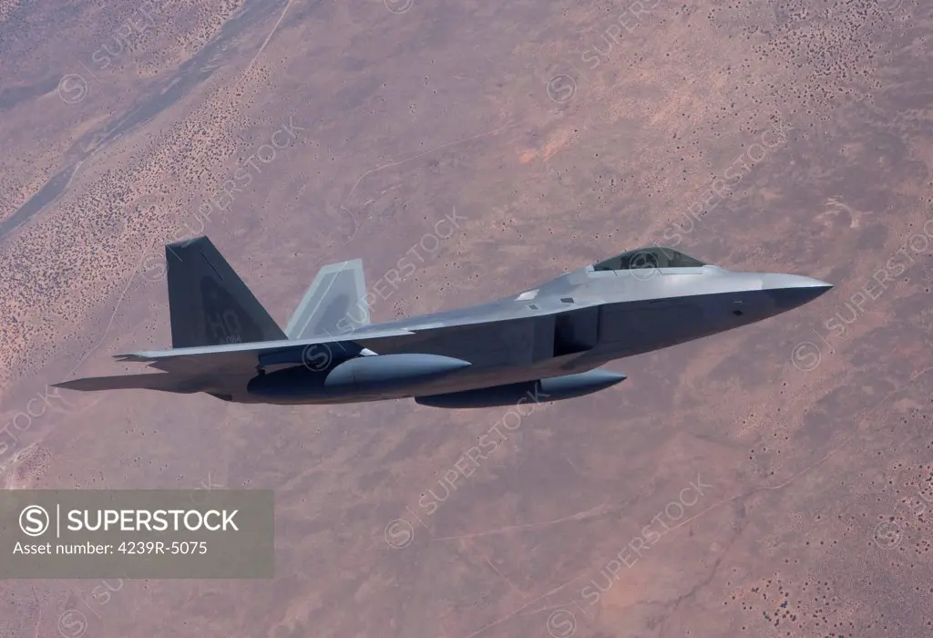 An F-22 Raptor from the 49th Fighter Wing maneuvers while on a training mission out of Holloman Air Force Base, New Mexico.