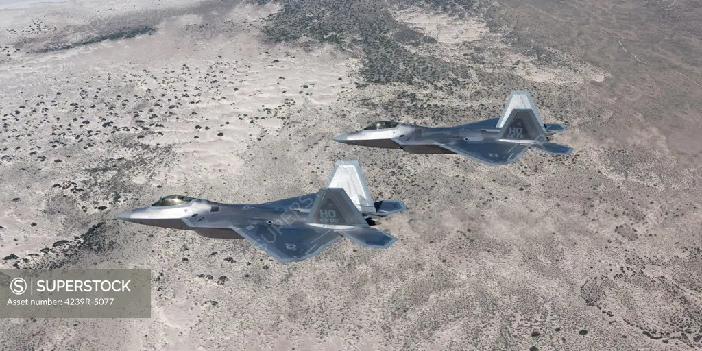Two F-22 Raptors from the 49th Fighter Wing flies in formation on a training mission out of Holloman Air Force Base, New Mexico.
