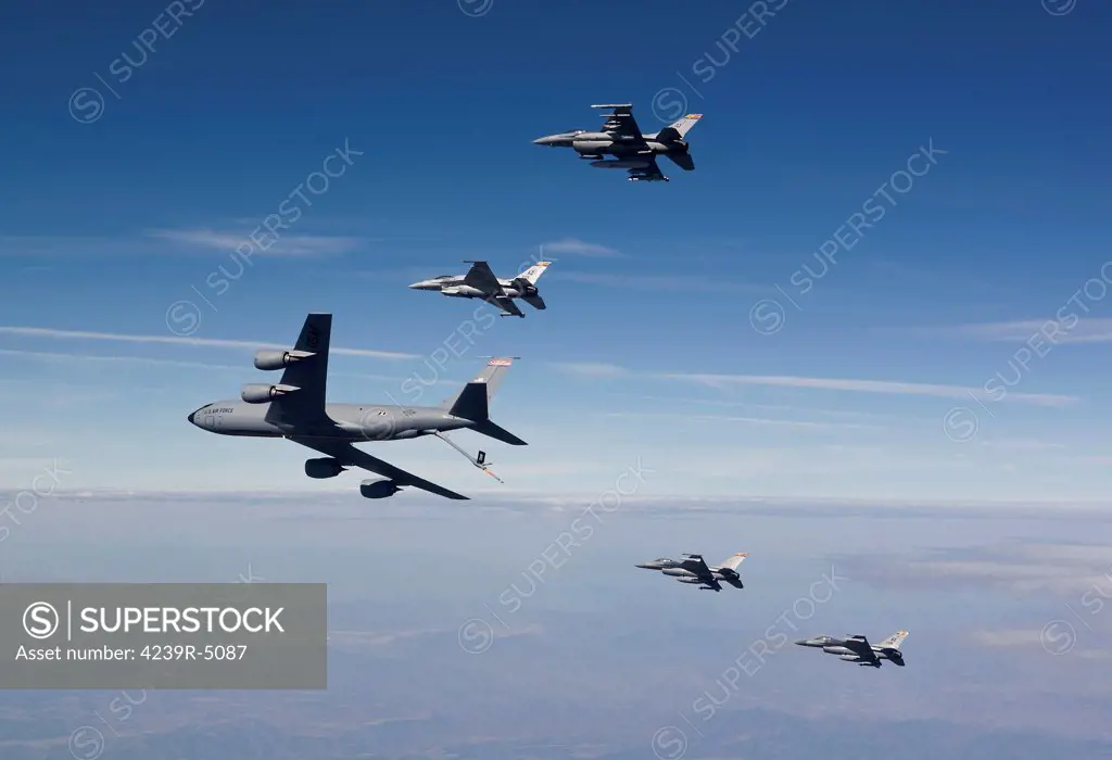 Four F-16's and a KC-135 from the Arizona Air National Guard fly in formation during a training mission over Southern Arizona.