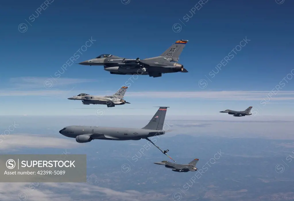 Four F-16's and a KC-135 from the Arizona Air National Guard fly in formation during a training mission over Southern Arizona.