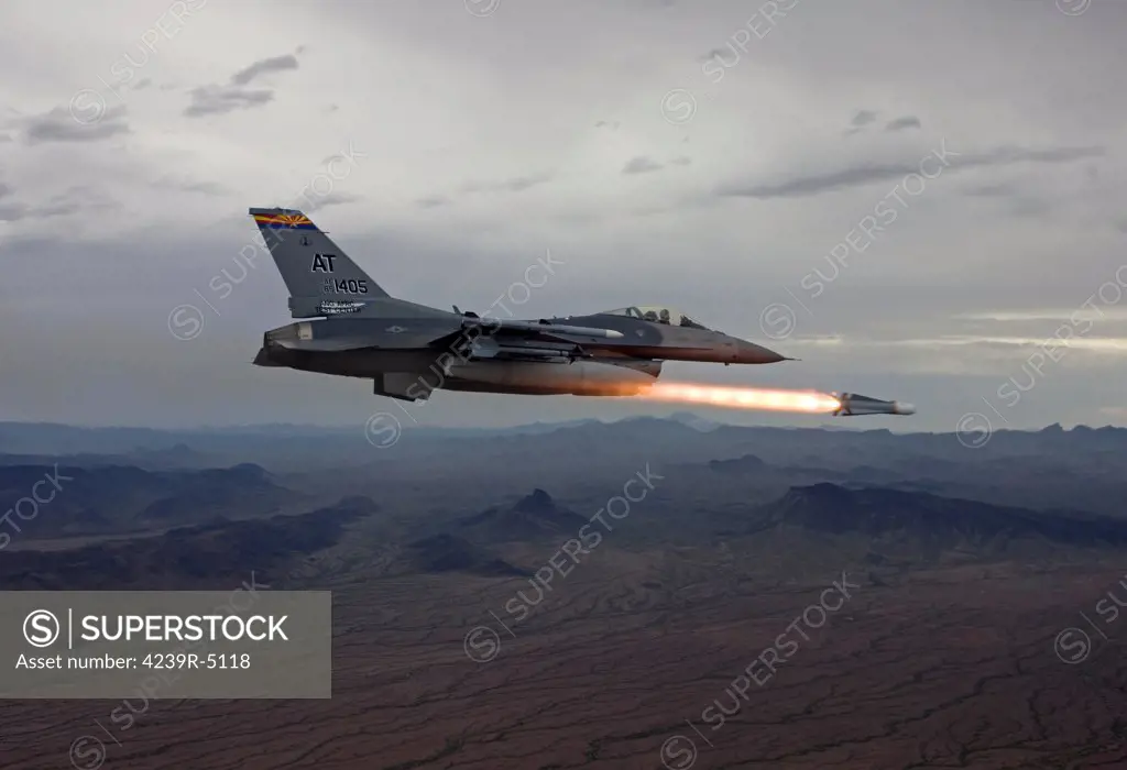An F-16 Fighting Falcon from the Air National Guard Air Force Reserve Test Center fires an AGM-65 Maverick missile during a test mission.