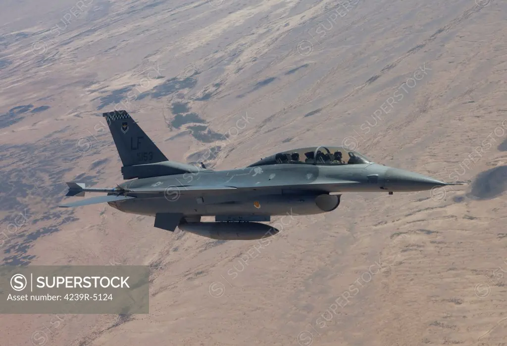 A 56th Fighter Wing F-16 Fighting Falcon from Luke Air Force Base, Arizona, manuevers during a training mission.