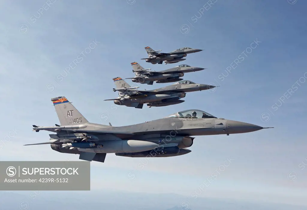 Four F-16's from the Air National Guard Air Force Reserve Test Center fly in formation during a test mission out of the Tucson International Airport, Arizona.