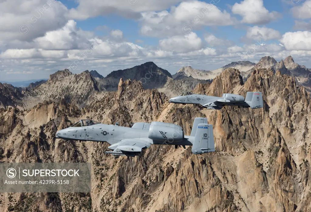 Two A-10 Thunderbolt's from the 124th Fighter Wing's 190th Fighter Squadron fly the jagged peaks of the Sawtooth Mountains in Central Idaho.