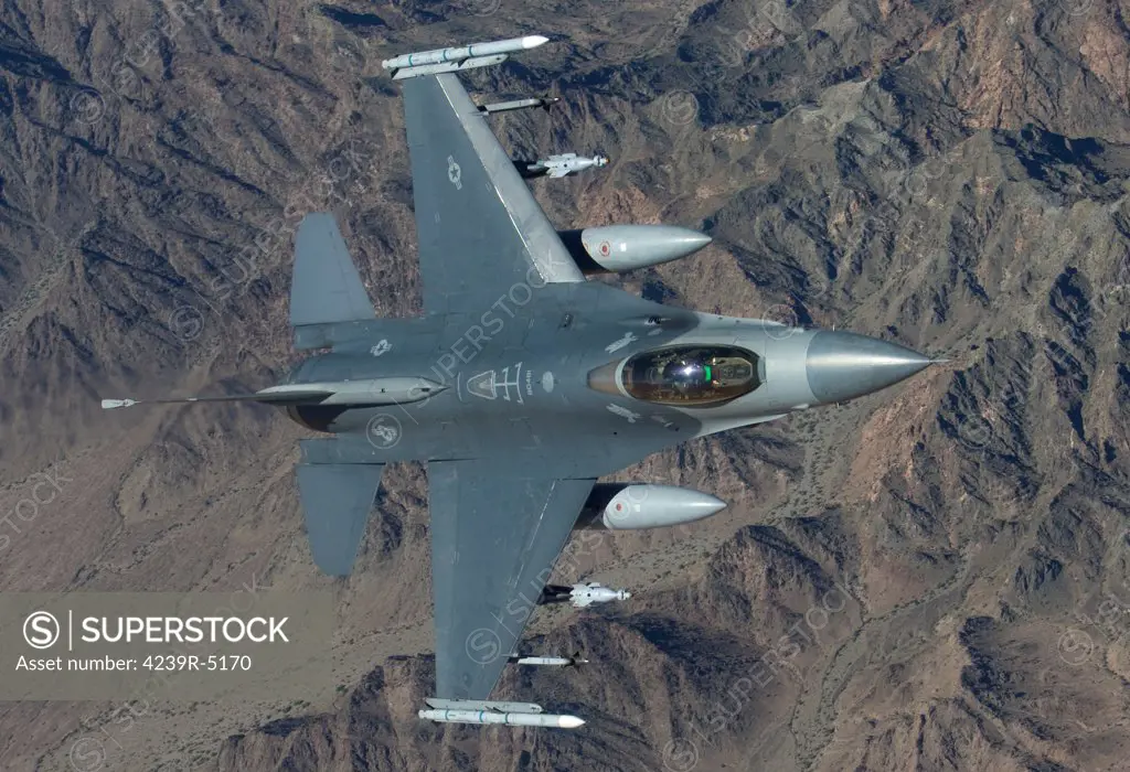 A 56th Fighter Wing F-16 Fighting Falcon from Luke Air Force Base, Arizona, manuevers during a training mission.