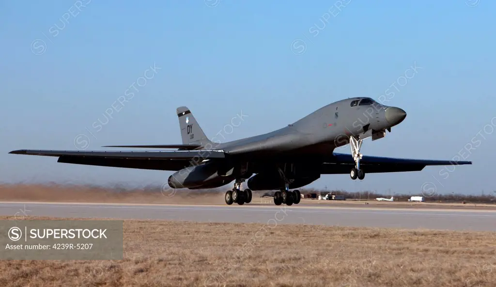 A 7th Bomb Wing B-1B Lancer takes off in the late afternoon from Dyess Air Force Base, Texas.
