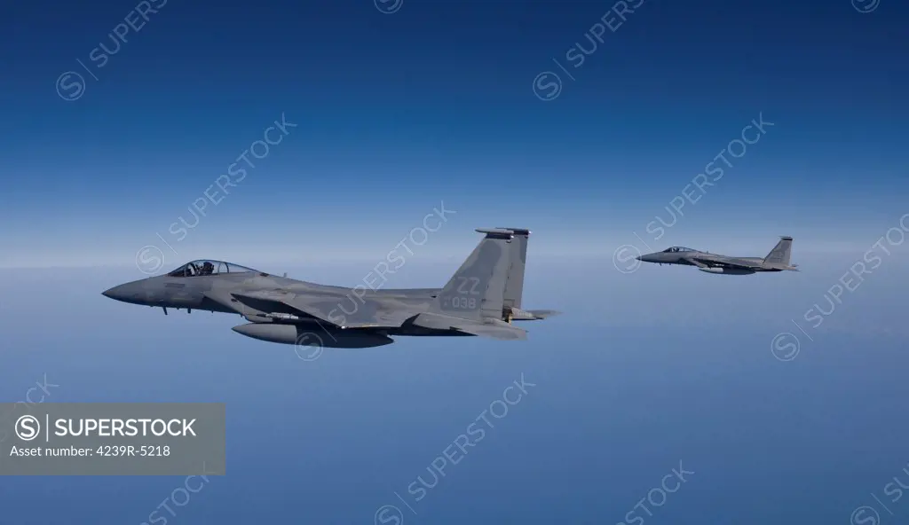 Two F-15 Eagles from the 44th Fighter Squadron fly over the Gulf of Mexico.