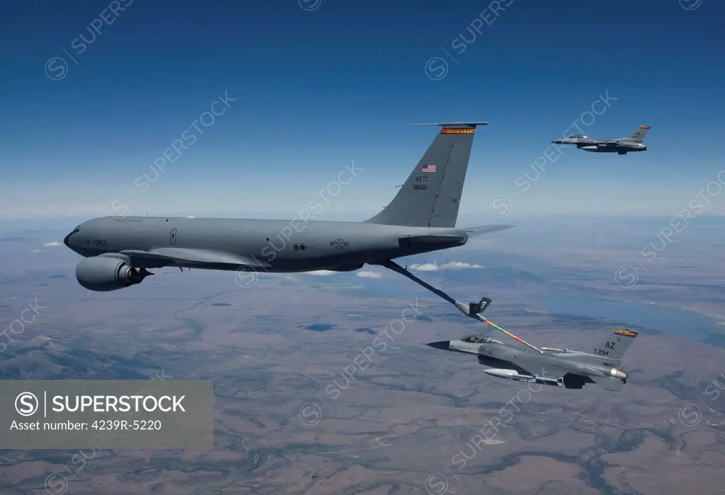 Two F-16's from the 162nd Fighter Wing conduct air to air refueling training with a KC-135 Stratotanker.