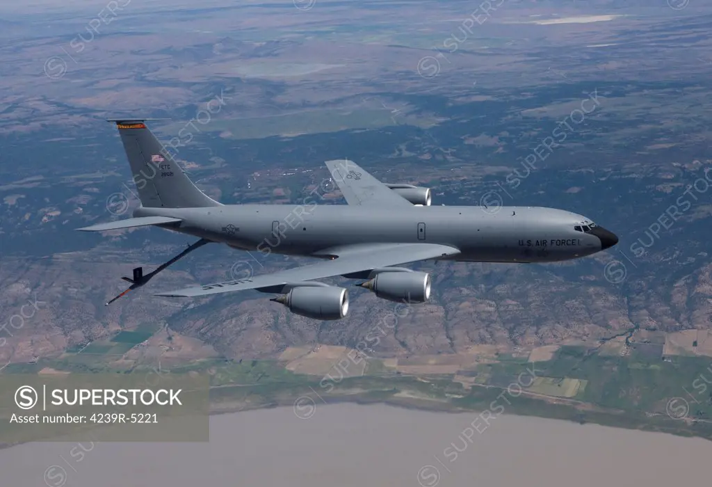 A KC-135R Stratotanker from the 97th Air Mobility Wing lowers it's boom to prepare to recieve aircraft for air to air refueling training over central Oregon.