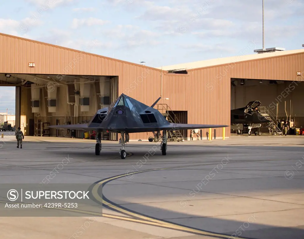 An F-117 Nighthawk taxi's out of it's hangar at Holloman Air Force Base, New Mexico.