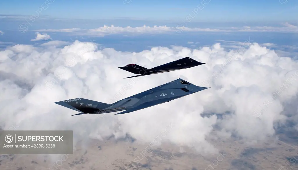 Two F-117 Nighthawk stealth fighters fly on a training sortie out of Holloman Air Force Base, New Mexico.