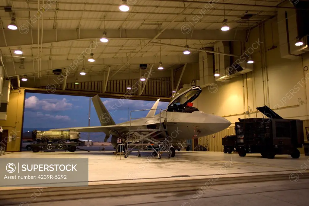 Maintence crews from the 49th Fighter Wing at Holloman Air Force Base, New Mexico, work on an F-22 Raptor.