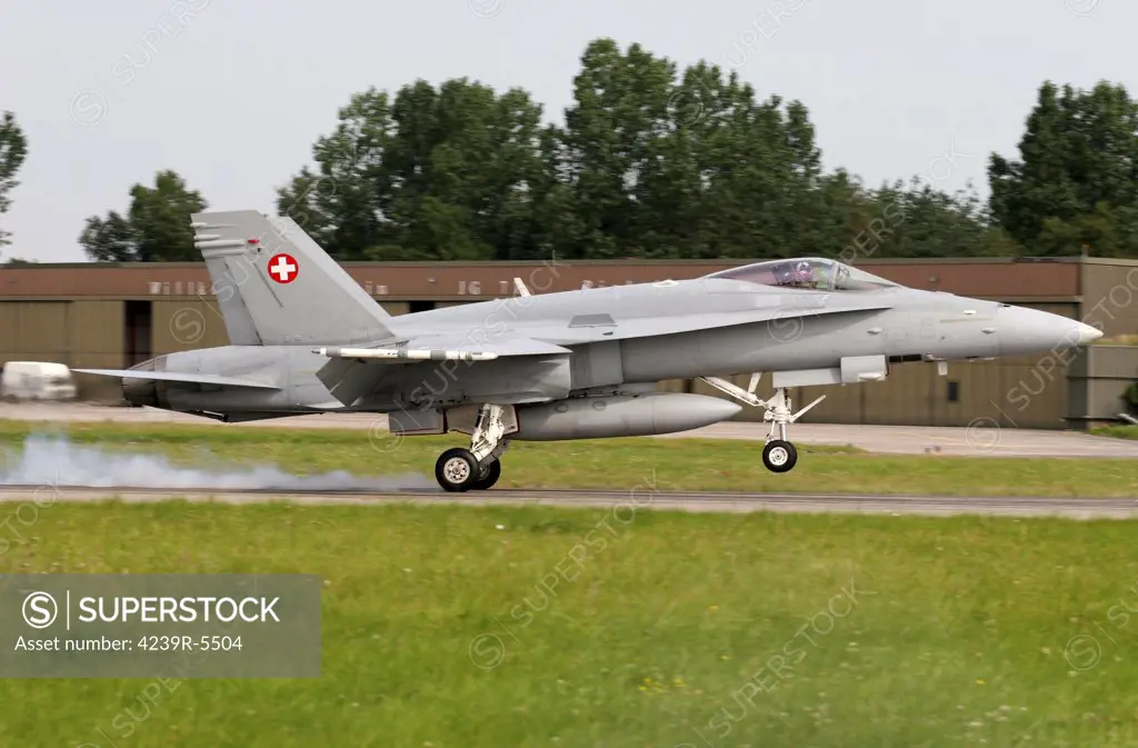 An F-18C Hornet of the Swiss Air Force landing at Wittmund, Germany, after Dissimilar Air Combat Training (DACT) with German F-4's.