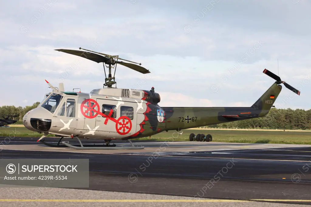 A German Army UH-1D helicopter of MTHR 30 from Niederstetten, painted in 30th anniversary colors, Rheine-Bentlage Airfield, Germany.