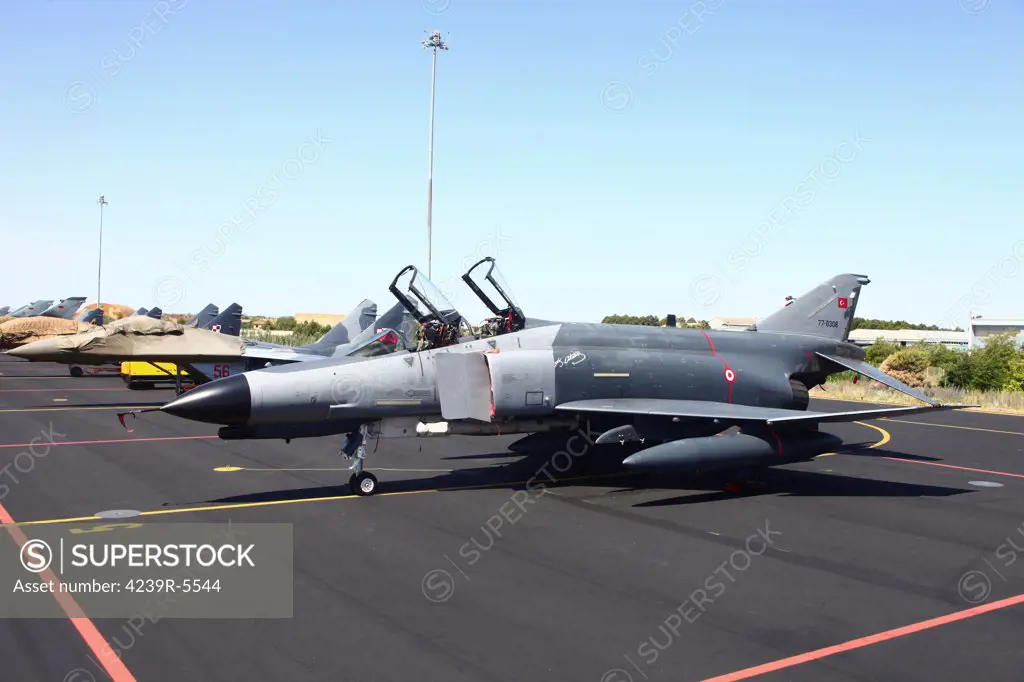 Turkish F-4E Phantom together with Polish MiG-29`s on the ramp at Albacate Airfield, Spain, during NATO's Tactical Leadership Program exercise.