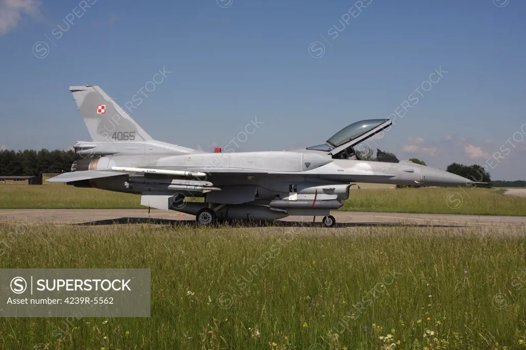 A Polish Air Force F-16C Block 52 aircraft with conformal fuel tanks and sniper targeting pod, Lechfeld Airfield, Germany.