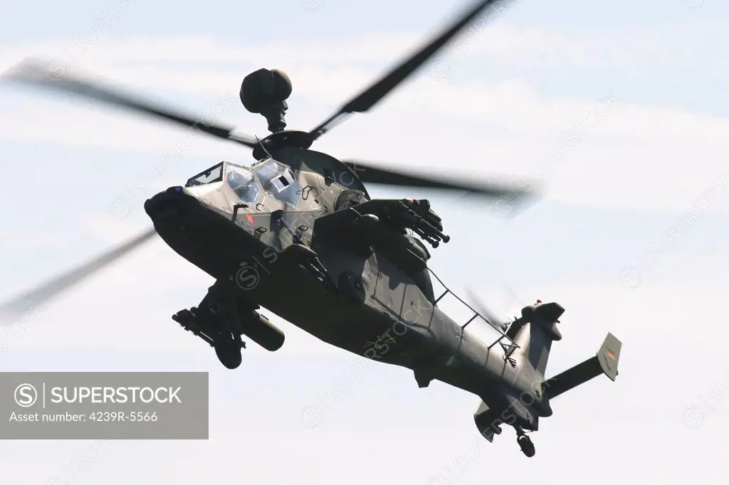 A German Army Tiger Eurocopter with gunpod, in flight over Germany.