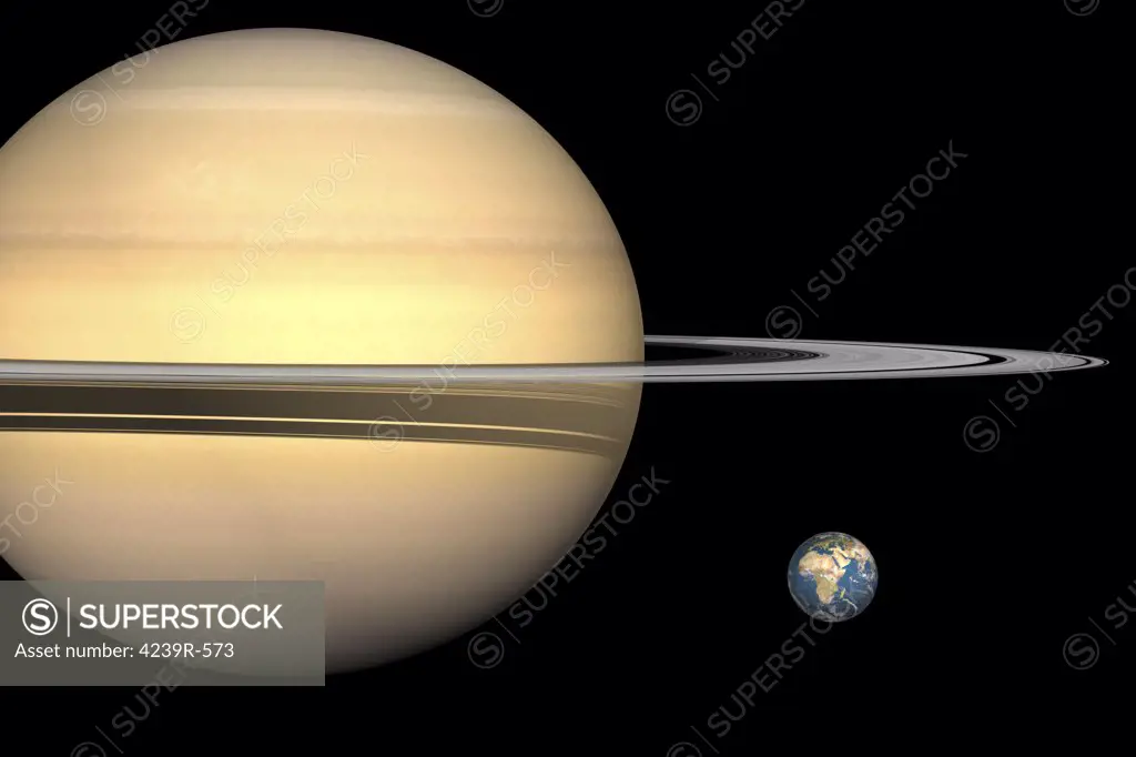 Illustration showing Saturn (left) and Earth (right) to scale