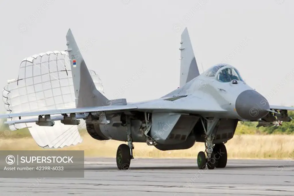 A Serbian Air Force MiG-29 with brake chute deployed.