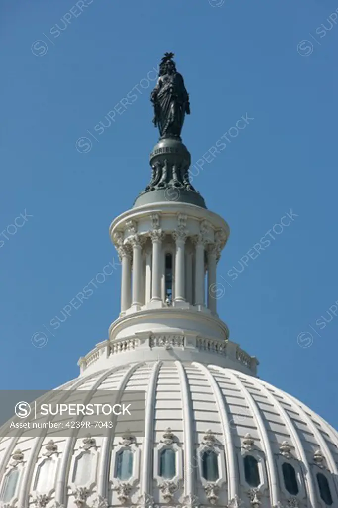 The United States Capitol building dome and statue, Washinton D.C., USA.
