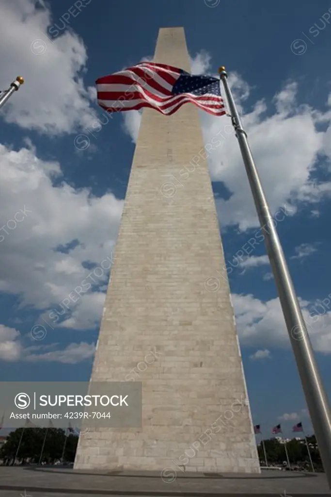 Washington Monument and American Flag, Washington D.C., USA.