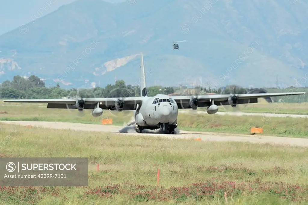 May 9, 2013 - A C-130 Hercules of the Italian Air Force landing on an unpaved landing strip, Grazzanise, Italy.
