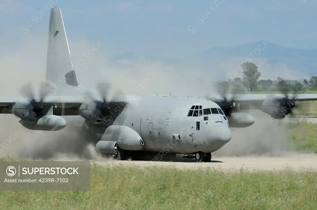 May 9, 2013 - A C-130 Hercules of the Italian Air Force landing on an unpaved landing strip, Grazzanise, Italy.
