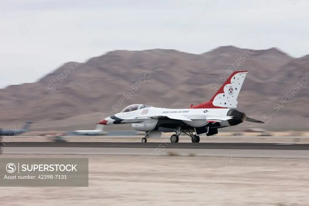 An F-16C Thunderbird takes off from Nellis Air Force Base, Nevada.