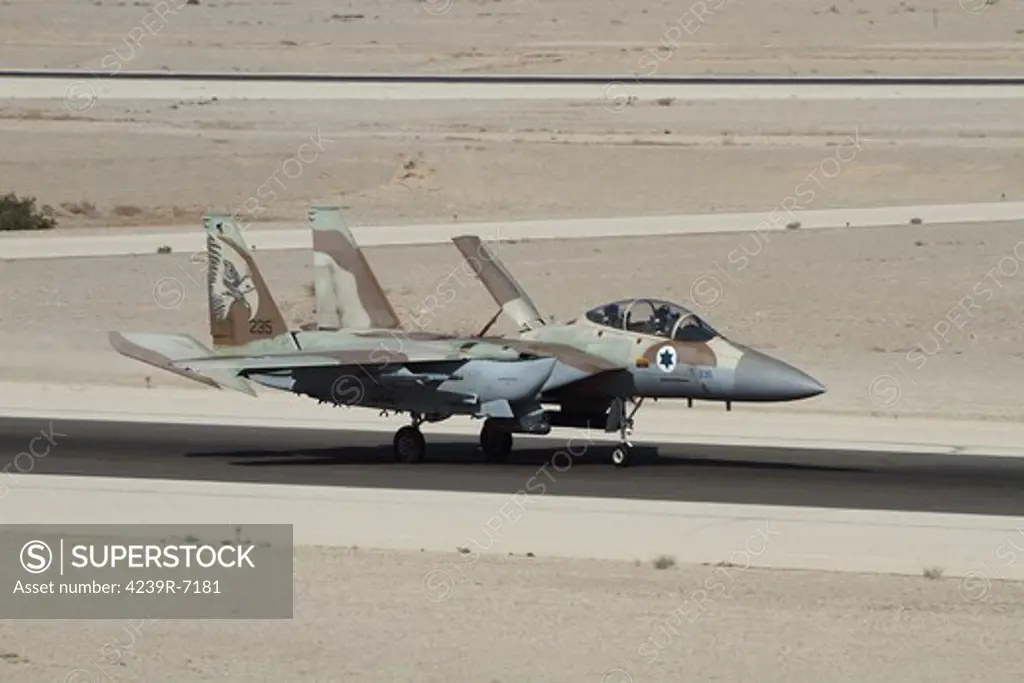 An F-15I Ra'am of the Israeli Air Force taxiing to its hardened shelter after landing with its air brake still open, Ovda Air Force Base, Israel.