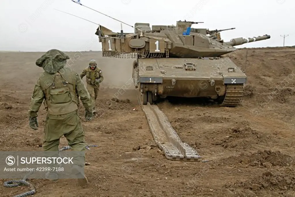 An Israel Defense Force Merkava Mark IV main battle tank during track replacement drill.