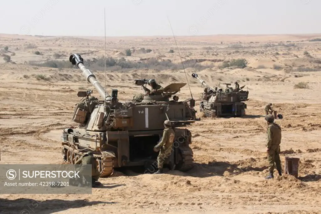 An Israel Defense Force Artillery Corps M109 Doher battery ready to fire.