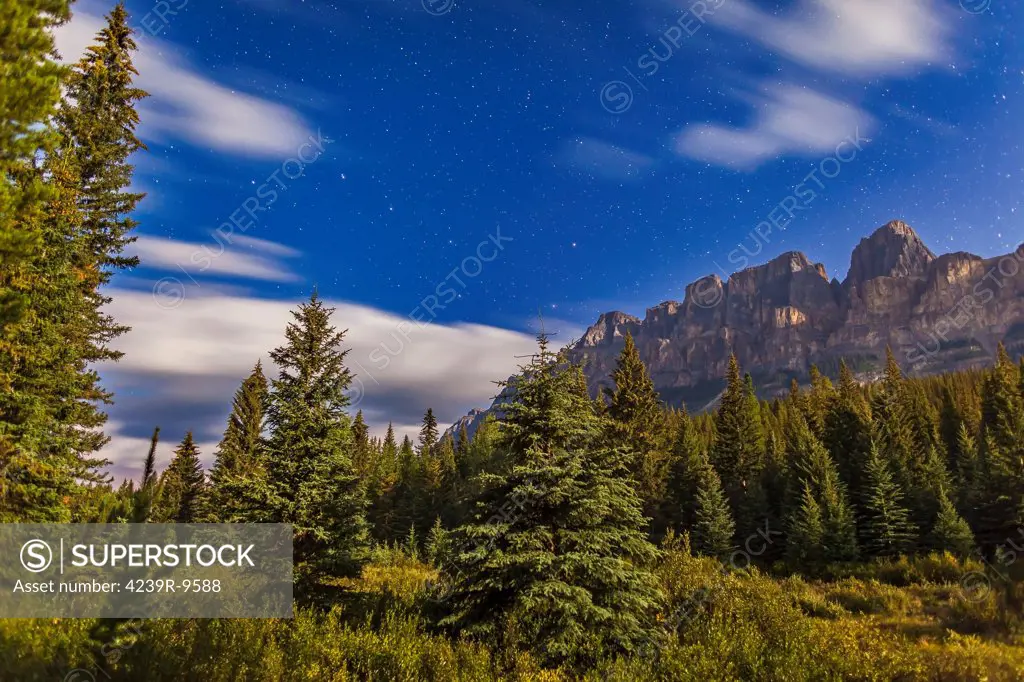 August 25, 2013 - The Big Dipper over Castle Mountain, Banff National Park, Canada, on a partly cloudy and dewy night.