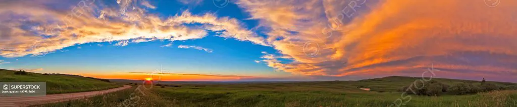 July 11, 2013 - Panoramic view of sunset at Reesor Ranch, near Cypress Hills, Alberta, Canda.