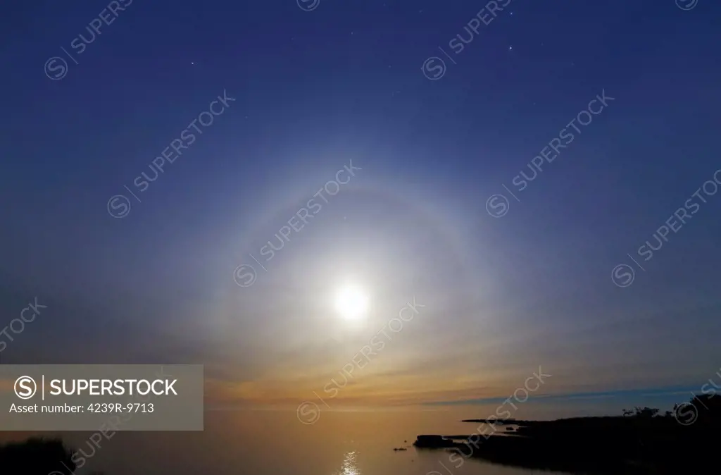 June 23, 2013 - A 22 degrees halo around the 2013 supermoon, Punta Piedras, Argentina.