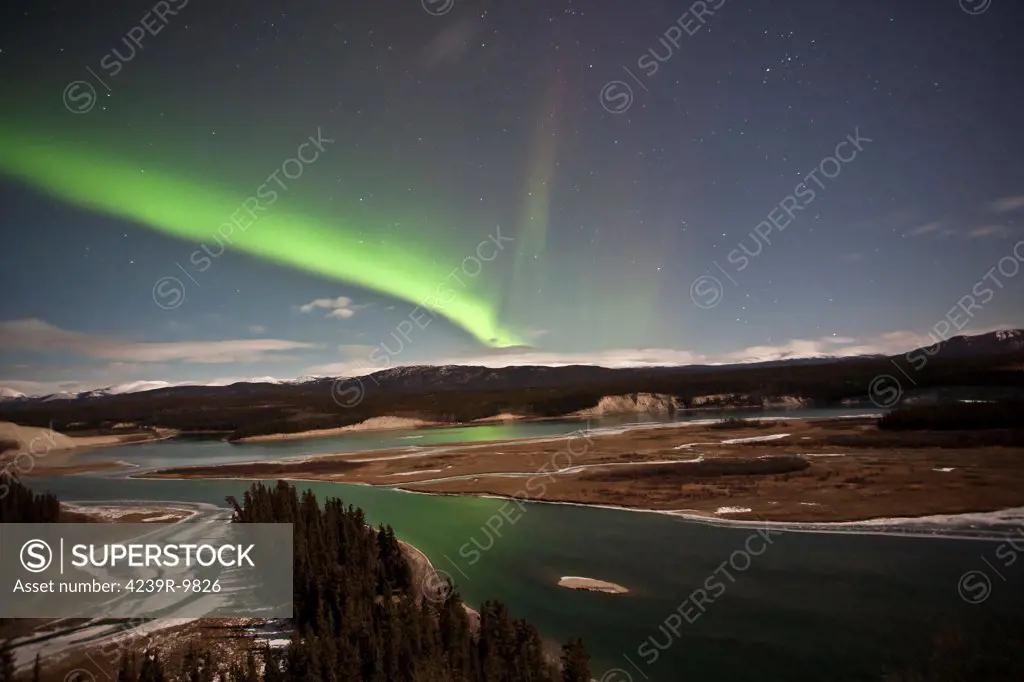 Aurora borealis over Yukon River, Yukon, Canda.